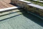 Natursteintreppe in den Pool